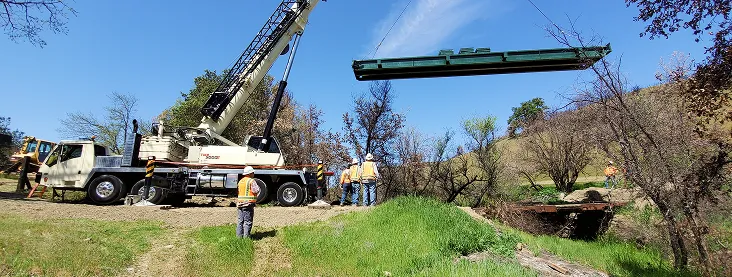 bridge-installation bulldozer-on-hill
