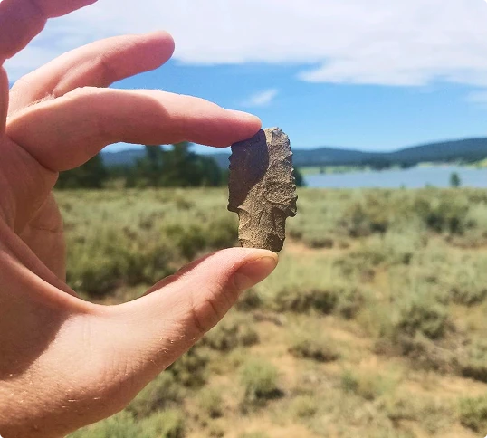 hand_holding_arrowhead hand_holding_arrowhead